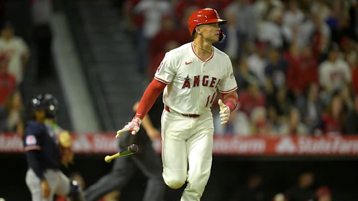 Apr 5, 2025; Anaheim, California, USA;  Los Angeles Angels catcher Logan O'Hoppe (14) watches as the ball clears the wall on a two-run home run in the fifth inning against the Cleveland Guardians at Angel Stadium. Mandatory Credit: Jayne Kamin-Oncea-Imagn Images