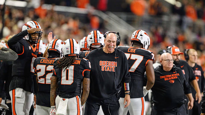Oct 18, 2025; Corvallis, Oregon, USA; Oregon State Beavers interim head coach Robb Akey greets running back Anthony Hankerson (0) after a score during the third quarter against the Lafayette Leopards at Reser Stadium. Mandatory Credit: Craig Strobeck-Imagn Images Oct 18, 2025; Corvallis, Oregon, USA; Oregon State Beavers interim head coach Robb Akey greets running back Anthony Hankerson (0) after a score during the third quarter against the Lafayette Leopards at Reser Stadium. Mandatory Credit: Craig Strobeck-Imagn Images