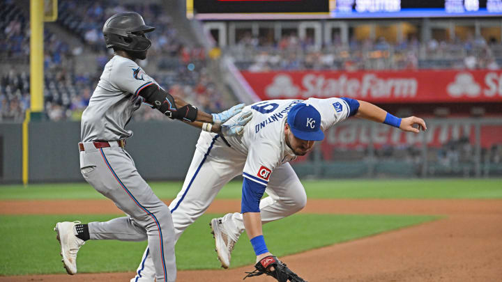 Jun 25, 2024; Kansas City, Missouri, USA; Miami Marlins left fielder Nick Gordon (1) is safe at first base after colliding with Kansas City Royals first baseman Vinnie Pasquantino (9) in the seventh inning at Kauffman Stadium. Jun 25, 2024; Kansas City, Missouri, USA; Miami Marlins left fielder Nick Gordon (1) is safe at first base after colliding with Kansas City Royals first baseman Vinnie Pasquantino (9) in the seventh inning at Kauffman Stadium.