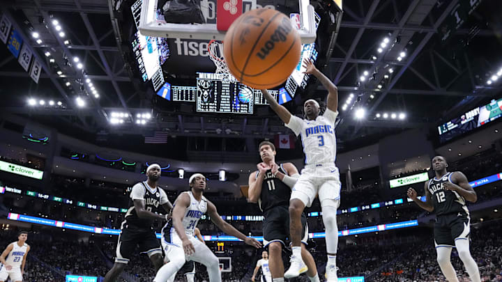 Jan 15, 2025; Milwaukee, Wisconsin, USA;  Orlando Magic guard Kentavious Caldwell-Pope (3) loses the ball during the second quarter against the Milwaukee Bucks at Fiserv Forum. Mandatory Credit: Jeff Hanisch-Imagn Images