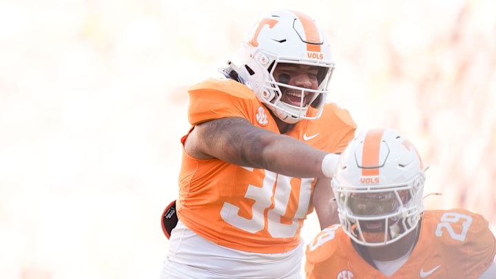 Tennessee defensive lineman Jamal Wallace (30) and Tennessee defensive lineman Jordan Ross (29) celebrate during a college football game between Tennessee and Arkansas at Neyland Stadium in Knoxville, Tennessee on Oct. 11, 2025. Tennessee defensive lineman Jamal Wallace (30) and Tennessee defensive lineman Jordan Ross (29) celebrate during a college football game between Tennessee and Arkansas at Neyland Stadium in Knoxville, Tennessee on Oct. 11, 2025.