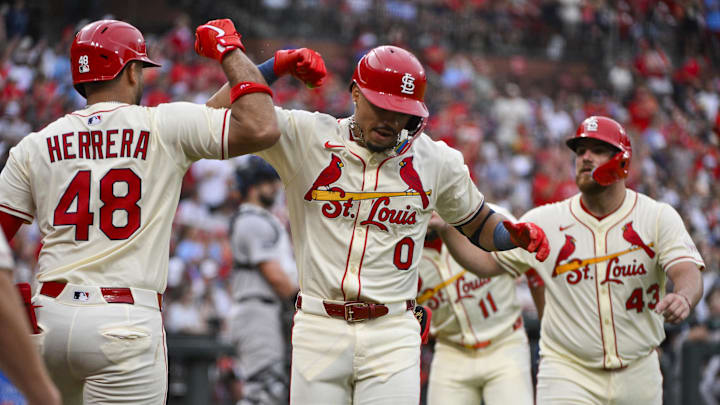 Aug 16, 2025; St. Louis, Missouri, USA;  St. Louis Cardinals shortstop Masyn Winn (0) celebrates with designated hitter Ivan Herrera (48) after hitting a three run home run against the New York Yankees during the second inning at Busch Stadium. Mandatory Credit: Jeff Curry-Imagn Images