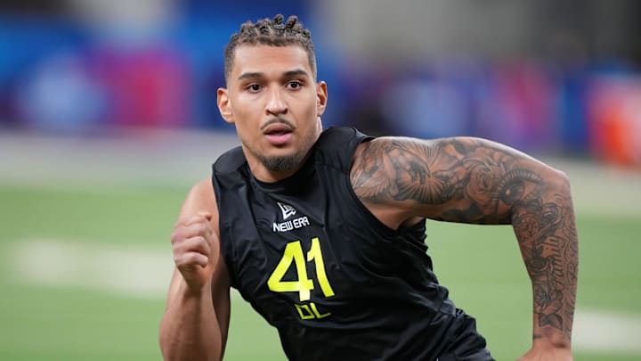 Miami defensive lineman Tyler Baron (DL41) participates in drills during the 2025 NFL Combine at Lucas Oil Stadium. 