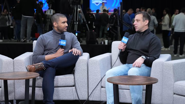 Feb 27, 2024; Indianapolis, IN, USA; CBS Sports lead insider reporter Jonathan Jones (left) interviews Kansas City Chiefs general manager Brett Veach during the NFL Scouting Combine at Indiana Convention Center. Mandatory Credit: Kirby Lee-Imagn Images