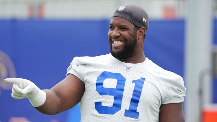 May 28, 2025; Woodland Hills, CA, USA; Los Angeles Rams defensive end Kobie Turner (91) having a fun moment during organized team activities at Rams Practice Facility. Mandatory Credit: Kirby Lee-Imagn Images May 28, 2025; Woodland Hills, CA, USA; Los Angeles Rams defensive end Kobie Turner (91) having a fun moment during organized team activities at Rams Practice Facility. Mandatory Credit: Kirby Lee-Imagn Images