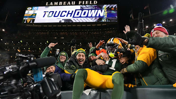 Green Bay Packers wide receiver Jayden Reed (11) celebrates after scoring a touchdown against the Miami Dolphins.