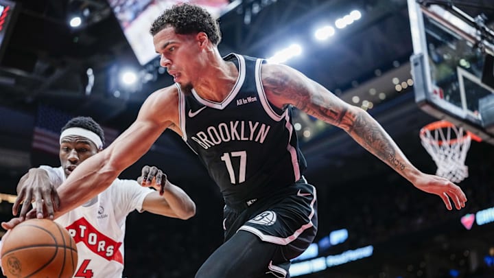 Oct 17, 2025; Toronto, Ontario, CAN; Brooklyn Nets forward Michael Porter Jr. (17) and Toronto Raptors guard Ja'Kobe Walter (14) battle for the ball during the third quarter at Scotiabank Arena. Mandatory Credit: Kevin Sousa-Imagn Images Oct 17, 2025; Toronto, Ontario, CAN; Brooklyn Nets forward Michael Porter Jr. (17) and Toronto Raptors guard Ja'Kobe Walter (14) battle for the ball during the third quarter at Scotiabank Arena. Mandatory Credit: Kevin Sousa-Imagn Images