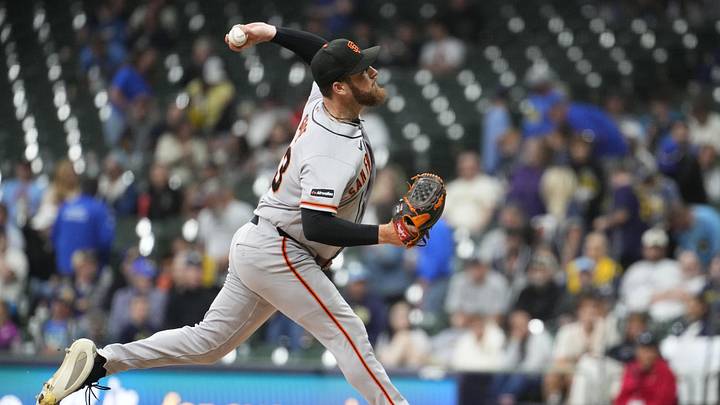 Jun 1, 2026; Milwaukee, Wisconsin, USA; San Francisco Giants pitcher Matt Gage (93) delivers a pitch against the Milwaukee Brewers in the seventh inning at American Family Field. Mandatory Credit: Michael McLoone-Imagn Images