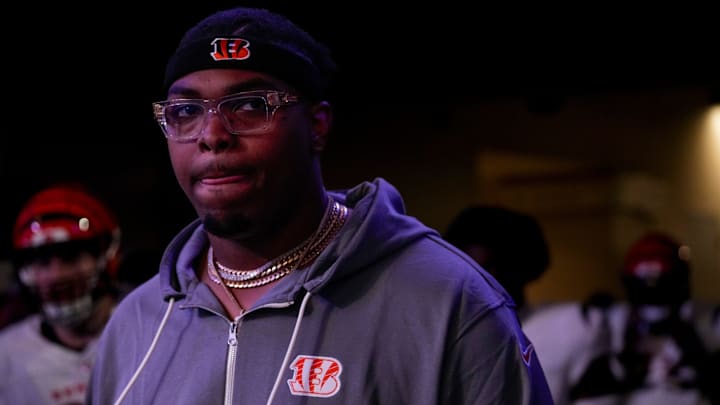 Injured Cincinnati Bengals offensive tackle Orlando Brown Jr. (75) walks on the field in the first quarter of the NFL Week 11 game between the Los Angeles Chargers and the Cincinnati Bengals at SoFi Stadium in Inglewood, Calif., on Sunday, Nov. 17, 2024. The Chargers led 24-6 at halftime.