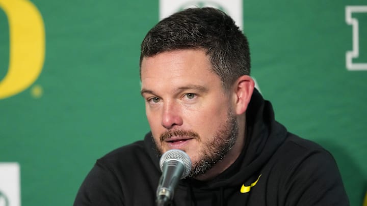 Nov 16, 2024; Madison, Wisconsin, USA; Oregon Ducks head coach Dan Lanning talks to the media during the post game press conference following the game against the Wisconsin Badgers at Camp Randall Stadium. Nov 16, 2024; Madison, Wisconsin, USA; Oregon Ducks head coach Dan Lanning talks to the media during the post game press conference following the game against the Wisconsin Badgers at Camp Randall Stadium.