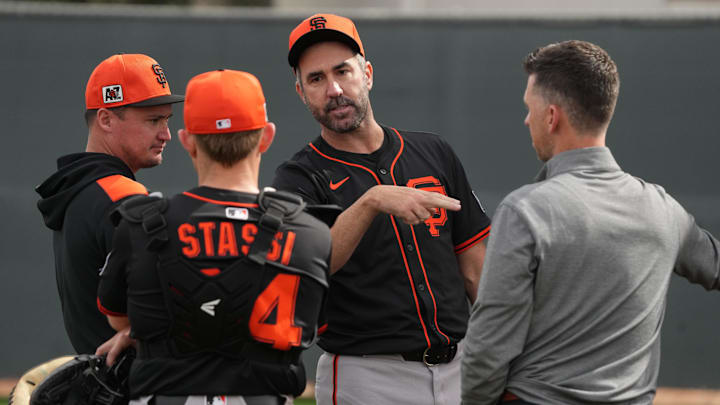 Scottsdale, AZ, USA; San Francisco Giants pitcher Justin Verlander (35) watches players work out in the bullpen during spring training camp.