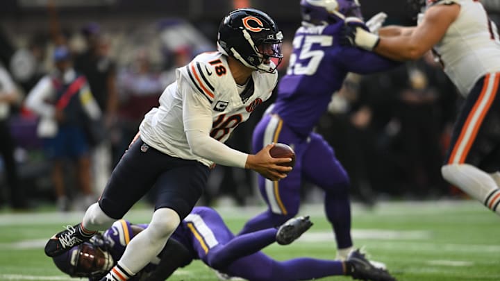 Nov 16, 2025; Minneapolis, Minnesota, USA; Chicago Bears quarterback Caleb Williams (18) scrambles in the pocket during the second quarter against the Minnesota Vikings 
at U.S. Bank Stadium. Mandatory Credit: Jeffrey Becker-Imagn Images