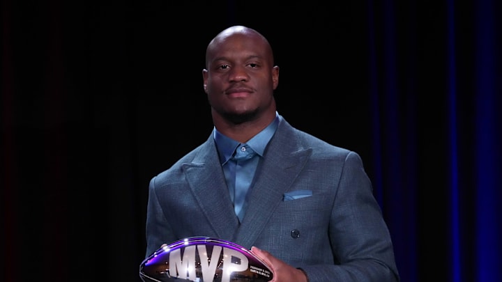 Feb 9, 2026; San Francisco, CA, USA; Seattle Seahawks running back Kenneth Walker III poses with the MVP trophy during the Super Bowl LX winning head coach and most valuable player press conference at Moscone Center. Walker signed a three-year, $ 43.05 million deal with the Chiefs in March. Mandatory Credit: Kirby Lee-Imagn Images