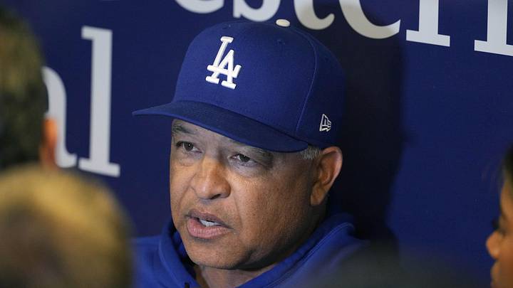 May 22, 2026; Milwaukee, Wisconsin, USA; Los Angeles Dodgers manager Dave Roberts (30) talks to media while doing an interview before a game against the Milwaukee Brewers at American Family Field. Mandatory Credit: Michael McLoone-Imagn Images