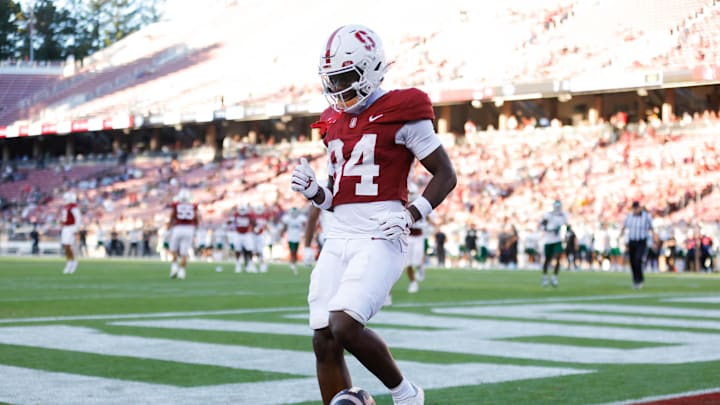 Sep 7, 2024; Stanford, California, USA; Stanford Cardinal wide receiver Ismael Cisse (84) scores a touchdown against the Cal Poly Mustangs during the second half at Stanford Stadium. Mandatory Credit: Sergio Estrada-Imagn Images Sep 7, 2024; Stanford, California, USA; Stanford Cardinal wide receiver Ismael Cisse (84) scores a touchdown against the Cal Poly Mustangs during the second half at Stanford Stadium. Mandatory Credit: Sergio Estrada-Imagn Images