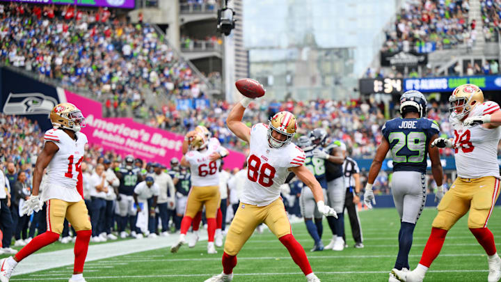 Sep 7, 2025; Seattle, Washington, USA; San Francisco 49ers tight end Jake Tonges (88) celebrates after scoring a touchdown against Seattle Seahawks cornerback Riq Woolen (27) during the second half at Lumen Field. Mandatory Credit: Steven Bisig-Imagn Images Sep 7, 2025; Seattle, Washington, USA; San Francisco 49ers tight end Jake Tonges (88) celebrates after scoring a touchdown against Seattle Seahawks cornerback Riq Woolen (27) during the second half at Lumen Field. Mandatory Credit: Steven Bisig-Imagn Images