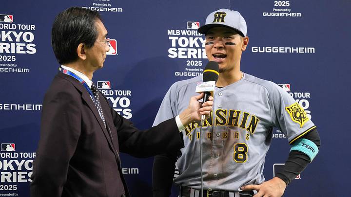 Mar 15, 2025; Bunkyo, Tokyo, Japan; Hanshin Tigers right fielder Teruaki Sato (8) is interviewed after defeating the Chicago Cubs at Tokyo Dome. Mandatory Credit: Darren Yamashita-Imagn Images Mar 15, 2025; Bunkyo, Tokyo, Japan; Hanshin Tigers right fielder Teruaki Sato (8) is interviewed after defeating the Chicago Cubs at Tokyo Dome. Mandatory Credit: Darren Yamashita-Imagn Images