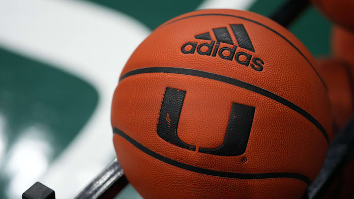 Dec 8, 2021; Coral Gables, Florida, USA; A general view of a basketball with the University of Miami logo on a rack prior to the game between the Miami Hurricanes and the Lipscomb Bisons at Watsco Center. Mandatory Credit: Jasen Vinlove-Imagn Images