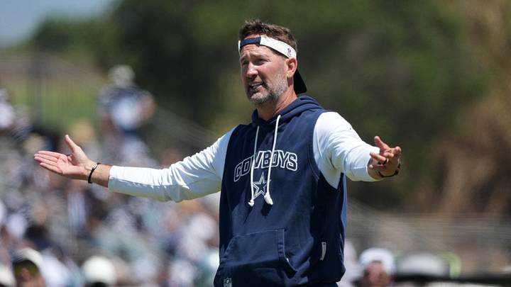 Aug 1, 2026; Oxnard, CA, USA; Dallas Cowboys coach Brian Schottenheimer at training camp at River Ridge Playing Fields. Mandatory Credit: Kirby Lee-Imagn Images Aug 1, 2026; Oxnard, CA, USA; Dallas Cowboys coach Brian Schottenheimer at training camp at River Ridge Playing Fields. Mandatory Credit: Kirby Lee-Imagn Images