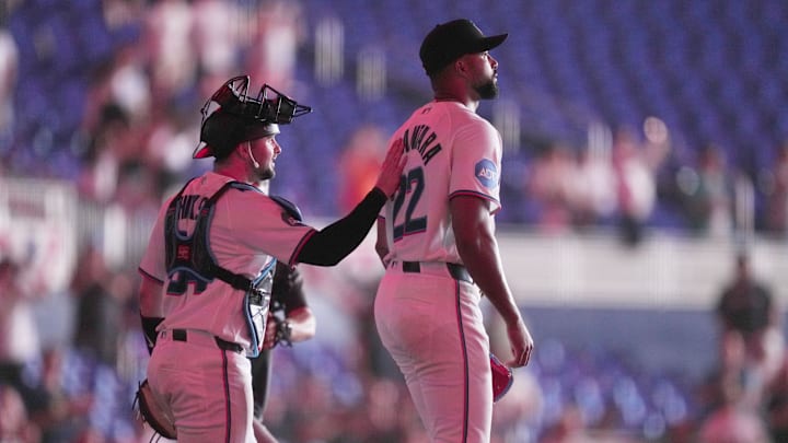 Apr 1, 2026; Miami, Florida, USA;  Miami Marlins starting pitcher Sandy Alcantara (22) reacts following his complete game shutout win over the Chicago White Sox by catcher Liam Hicks (34) at loanDepot Park. Mandatory Credit: Jim Rassol-Imagn Images