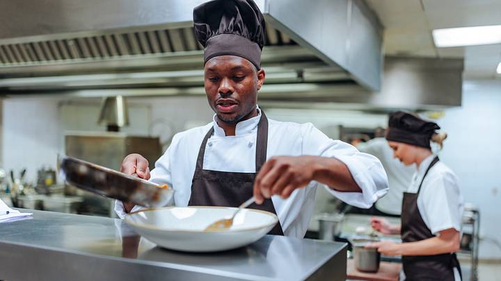 Chef finishing dish