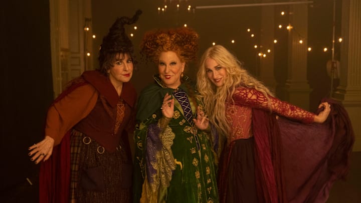 Kathy Najimy as Mary Sanderson, Bette Midler as Winifred Sanderson, and Sarah Jessica Parker as Sarah Sanderson in HOCUS POCUS 2, exclusively on Disney+. Photo by Matt Kennedy. © 2022 Disney Enterprises, Inc. All Rights Reserved. Kathy Najimy as Mary Sanderson, Bette Midler as Winifred Sanderson, and Sarah Jessica Parker as Sarah Sanderson in HOCUS POCUS 2, exclusively on Disney+. Photo by Matt Kennedy. © 2022 Disney Enterprises, Inc. All Rights Reserved.