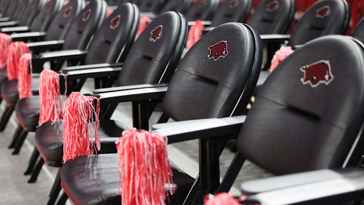 Jan 11, 2025; Fayetteville, Arkansas, USA; Arkansas Razorbacks front row seats prior to the game against the Florida Gators at Bud Walton Arena. Mandatory Credit: Nelson Chenault-Imagn Images