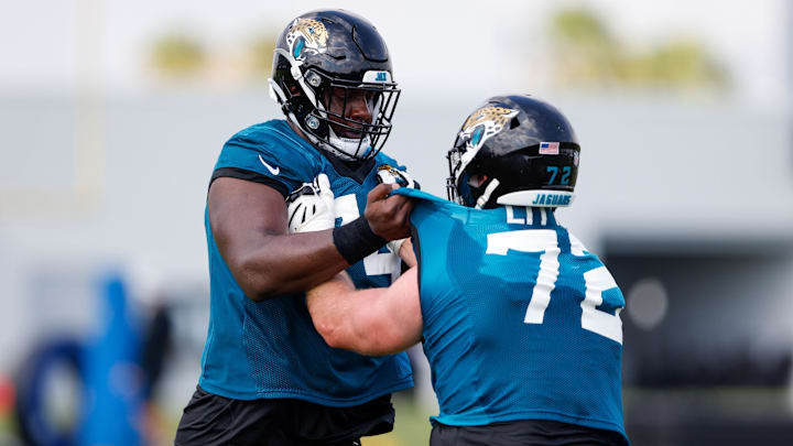 Jul 30, 2021; Jacksonville, FL, USA;  Jacksonville Jaguars offensive tackle Walker Little (72) and