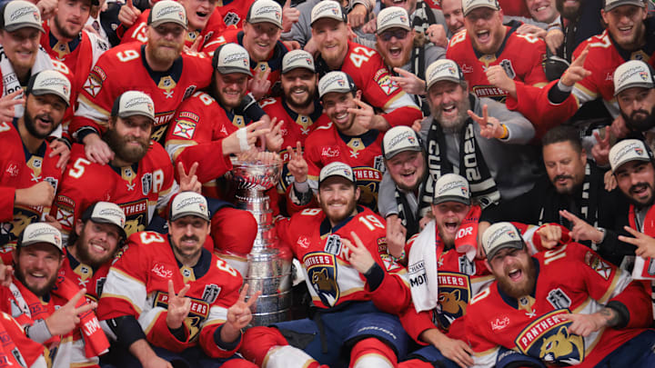 The Florida Panthers pose for a photo with the Stanley Cup after winning game six of the 2025 Stanley Cup Final against the Edmonton Oilers at Amerant Bank Arena.