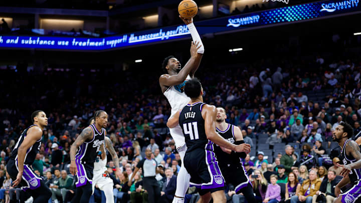 Mar 17, 2025; Sacramento, California, USA; Memphis Grizzlies forward Jaren Jackson Jr. (13) shoots the ball against Sacramento Kings forward Trey Lyles (41) during the fourth quarter at Golden 1 Center. Mandatory Credit: Sergio Estrada-Imagn Images