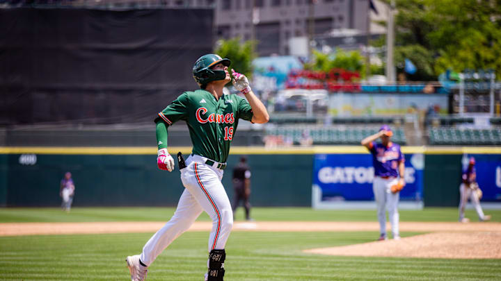 May 23, 2024; Charlotte, NC, USA; Miami (Fl) Hurricanes outfielder Jake Kulikowski (19) celebrates a home run during the ninth inning against the Clemson Tigers during the ACC Baseball Tournament at Truist Field. 