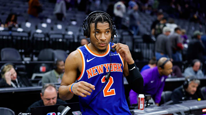 Mar 10, 2025; Sacramento, California, USA; New York Knicks guard Miles McBride (2) is interviewed by media after the game against the Sacramento Kings at Golden 1 Center. Mandatory Credit: Sergio Estrada-Imagn Images
