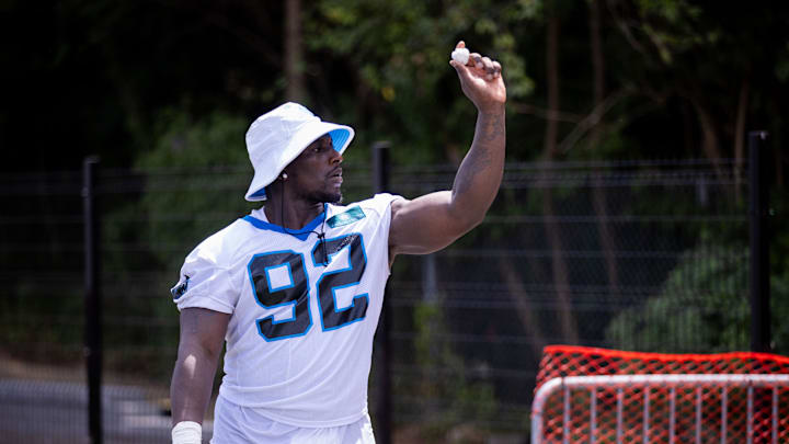 Jul 24, 2025; Charlotte, NC, USA; Carolina Panthers defensive tackle Tershawn Wharton (92) plays around as he waits to be interviewed during training camp. Mandatory Credit: Scott Kinser-Imagn Images Jul 24, 2025; Charlotte, NC, USA; Carolina Panthers defensive tackle Tershawn Wharton (92) plays around as he waits to be interviewed during training camp. Mandatory Credit: Scott Kinser-Imagn Images