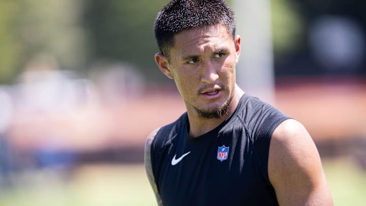 Jul 26, 2025; Charlotte, NC, USA; Carolina Panthers wide receiver Tetairoa McMillan (4) walks off after practice during training camp. Mandatory Credit: Scott Kinser-Imagn Images