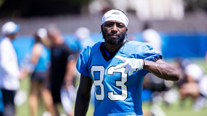 Jul 26, 2025; Charlotte, NC, USA; Carolina Panthers wide receiver David Moore (83) mugs for the camera as he walks off after practice during training camp. Mandatory Credit: Scott Kinser-Imagn Images Jul 26, 2025; Charlotte, NC, USA; Carolina Panthers wide receiver David Moore (83) mugs for the camera as he walks off after practice during training camp. Mandatory Credit: Scott Kinser-Imagn Images
