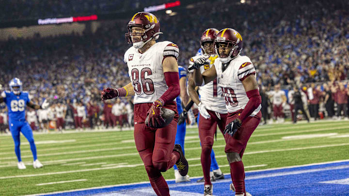 Jan 18, 2025; Detroit, Michigan, USA;  Washington Commanders tight end Zach Ertz (86) celebrates a touchdown during the second quarter against Detroit Lions at Ford Field. Mandatory Credit: David Reginek-Imagn Images