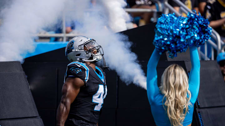 Carolina Panthers linebacker Charles Harris (40) runs out for a game against the New Orleans Saints.