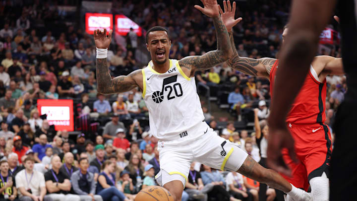 Oct 7, 2024; Salt Lake City, Utah, USA; Utah Jazz forward John Collins (20) reacts to a play against the Houston Rockets during the second quarter at Delta Center. Mandatory Credit: Rob Gray-Imagn Images
