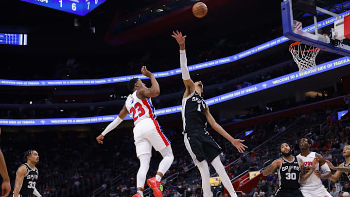 Detroit Pistons guard Jaden Ivey (23) shoots on San Antonio Spurs center Victor Wembanyama (1) in the first half at Little Caesars Arena. Mandatory Credit: Rick Osentoski-Imagn Images Detroit Pistons guard Jaden Ivey (23) shoots on San Antonio Spurs center Victor Wembanyama (1) in the first half at Little Caesars Arena. Mandatory Credit: Rick Osentoski-Imagn Images