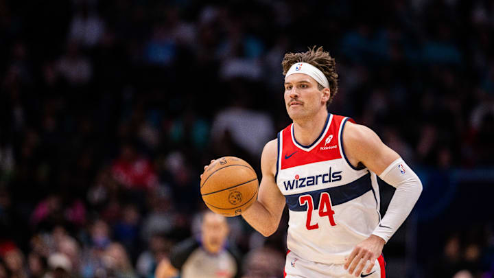 Mar 1, 2025; Charlotte, North Carolina, USA; Washington Wizards forward Corey Kispert (24) brings the ball up court against the Charlotte Hornets during the third quarter at Spectrum Center. Mandatory Credit: Scott Kinser-Imagn Images