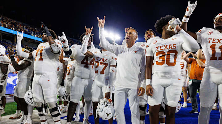 Oct 18, 2025; Lexington, Kentucky, USA; Texas Longhorns head coach Steve Sarkisian celebrates with his team after winning the game against the Kentucky Wildcats at Kroger Field. Mandatory Credit: Jordan Prather-Imagn Images Oct 18, 2025; Lexington, Kentucky, USA; Texas Longhorns head coach Steve Sarkisian celebrates with his team after winning the game against the Kentucky Wildcats at Kroger Field. Mandatory Credit: Jordan Prather-Imagn Images