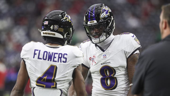 Dec 15, 2024; Houston, Texas, USA; Baltimore Ravens quarterback Lamar Jackson (8) shakes hands with wide receiver Zay Flowers (4) before the game against the Houston Texans at NRG Stadium. Mandatory Credit: Troy Taormina-Imagn Images Dec 15, 2024; Houston, Texas, USA; Baltimore Ravens quarterback Lamar Jackson (8) shakes hands with wide receiver Zay Flowers (4) before the game against the Houston Texans at NRG Stadium. Mandatory Credit: Troy Taormina-Imagn Images
