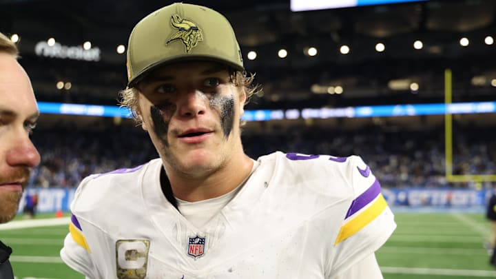 Minnesota Vikings quarterback J.J. McCarthy (9) walks off the field after the game against the Detroit Lions at Ford Field.