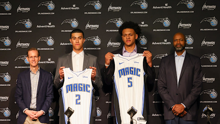 Jun 24, 2022; Orlando, Florida, USA; Orlando Magic president of basketball operations Jeff Weltman (left), second round draft pick Caleb Houstan (center left), first overall draft pick Paolo Banchero (center right) and Orlando Magic Coach Jamahl Mosley during a press conference at the Amway Center. Mandatory Credit: Nathan Ray Seebeck-Imagn Images