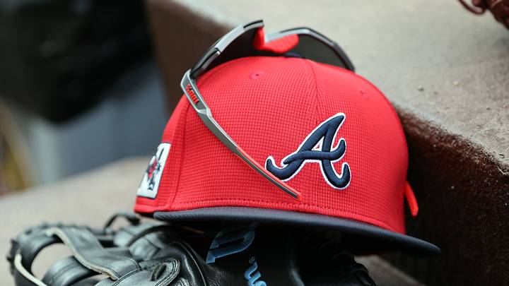 wMar 1, 2025; North Port, Florida, USA; A detail view of Atlanta Braves hat, sunglasses and glove in the dugout during the fifth inning at CoolToday Park. Mandatory Credit: Kim Klement Neitzel-Imagn Images wMar 1, 2025; North Port, Florida, USA; A detail view of Atlanta Braves hat, sunglasses and glove in the dugout during the fifth inning at CoolToday Park. Mandatory Credit: Kim Klement Neitzel-Imagn Images
