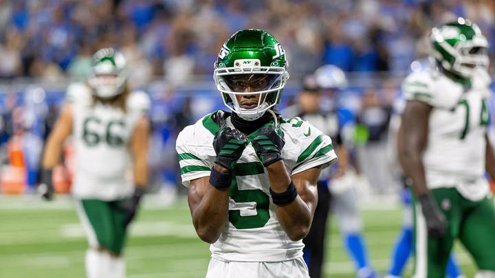 Sep 27, 2026; Detroit, Michigan, USA;  New York Jets wide receiver Garrett Wilson (5) celebrates during the game against the Detroit Lions at Ford Field.  Mandatory Credit: David Reginek-Imagn Images