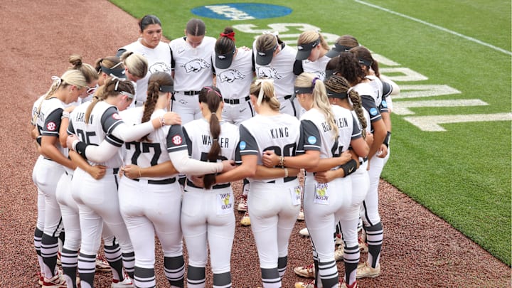 May 25, 2025; Fayetteville, AR, USA; Arkansas Razorbacks huddle prior to taking on the Ole Miss Rebels in game three of the Fayetteville Super Regional at Bogle Park. Mandatory Credit: Nelson Chenault-Imagn Images May 25, 2025; Fayetteville, AR, USA; Arkansas Razorbacks huddle prior to taking on the Ole Miss Rebels in game three of the Fayetteville Super Regional at Bogle Park. Mandatory Credit: Nelson Chenault-Imagn Images