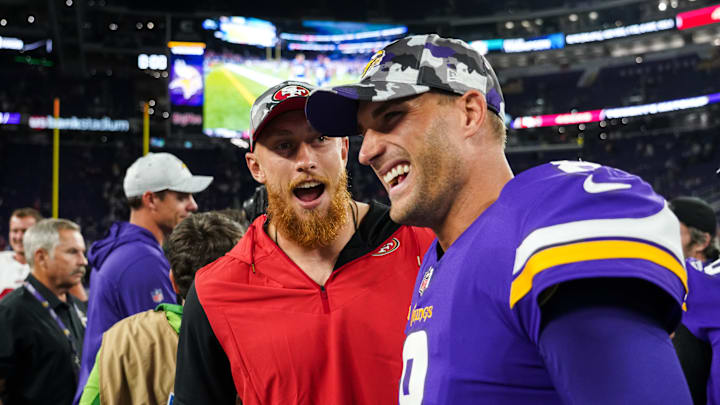San Francisco 49ers tight end George Kittle (L) and Minnesota Vikings quarterback Kirk Cousins (R)