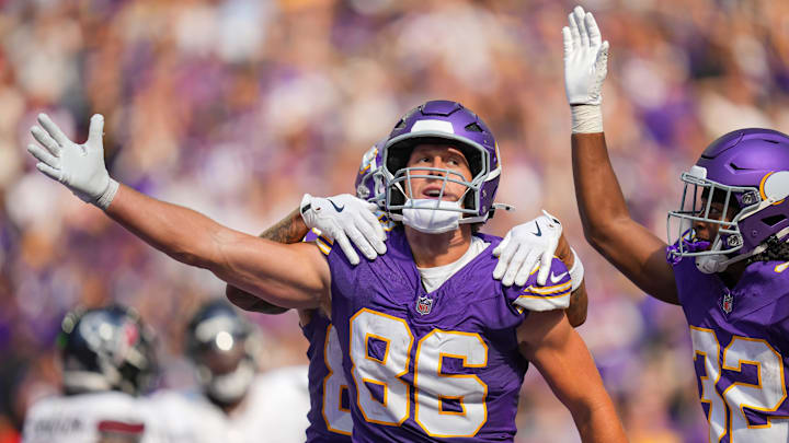 Sep 22, 2024; Minneapolis, Minnesota, USA; Minnesota Vikings tight end Johnny Mundt (86) celebrates his touchdown against the Houston Texans in the fourth quarter at U.S. Bank Stadium. Mandatory Credit: Brad Rempel-Imagn Images