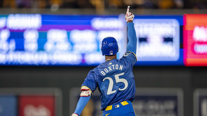 Minnesota Twins center fielder Byron Buxton (25) celebrates after hitting a solo home run against the Cincinnati Reds in the fifth inning at Target Field in Minneapolis on Sept. 13, 2024. 